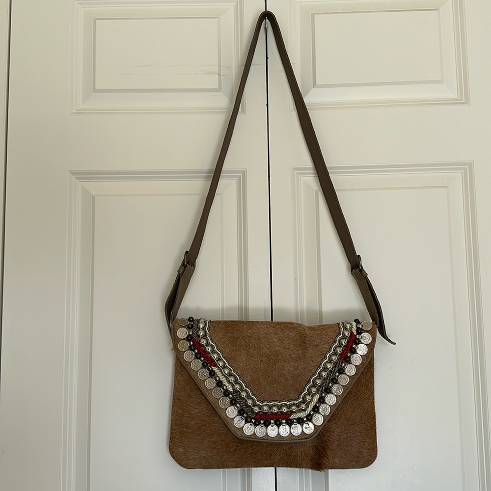 SHASHI Calf leather crossbody purse  coin beaded embellishment. Leather strap